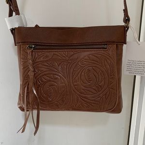 The Sak Sanibel Mini Crossbody with adjustable strap